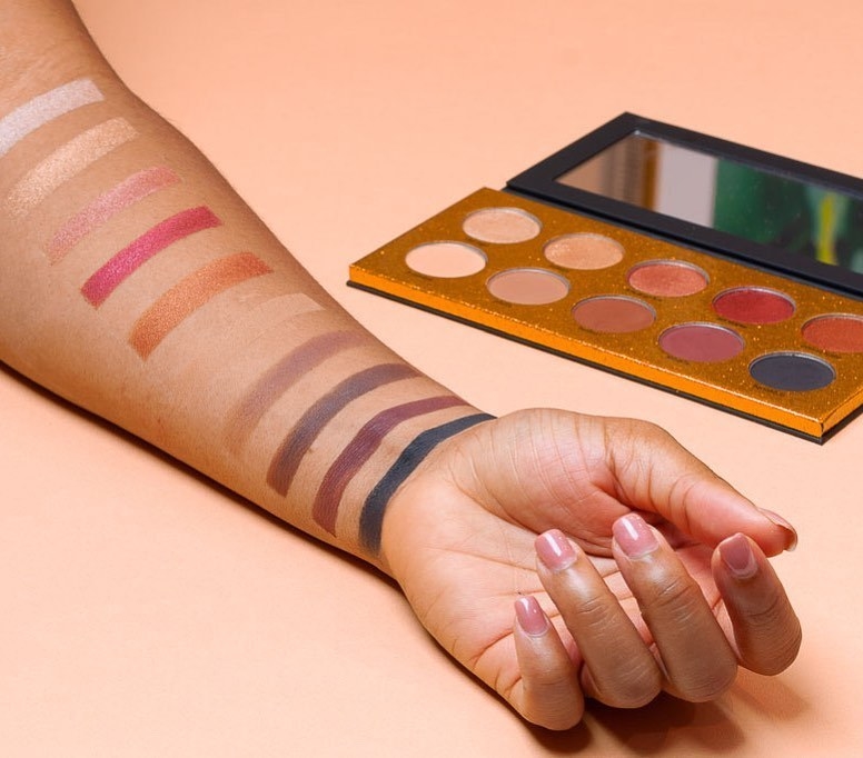 The palette and a person with swatches on their arm