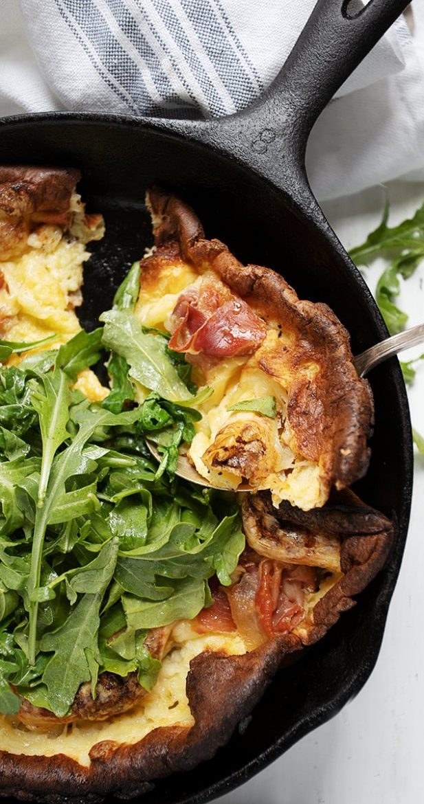 A savory Dutch baby filled with prosciutto, Swiss cheese, and arugula.