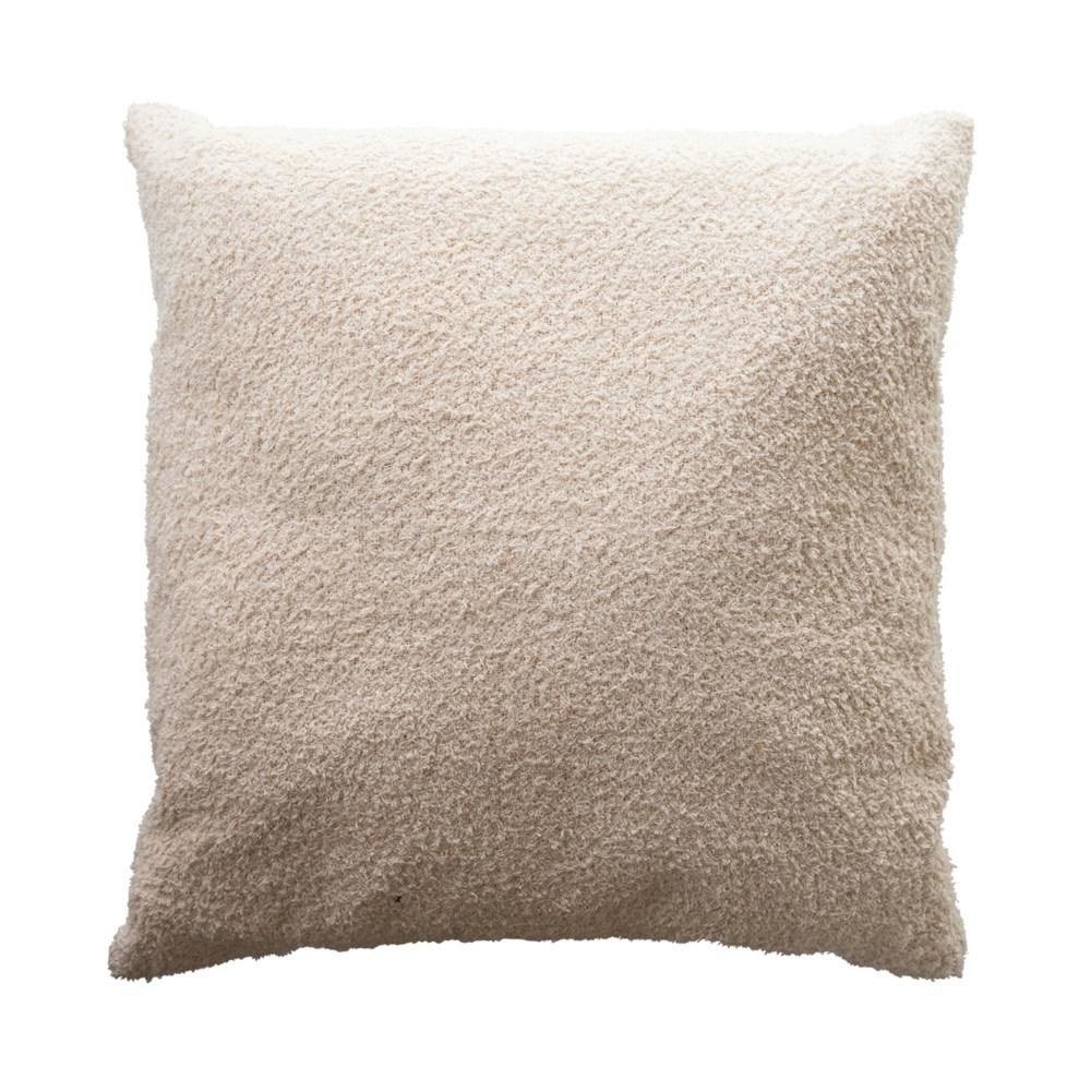 the tan throw pillow