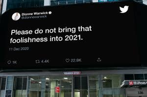 Dionne Warwick's tweet "Please do not bring that foolishness into 2021" on a sign