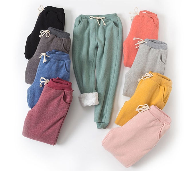 nine pairs of flygo fleece joggers in different colors