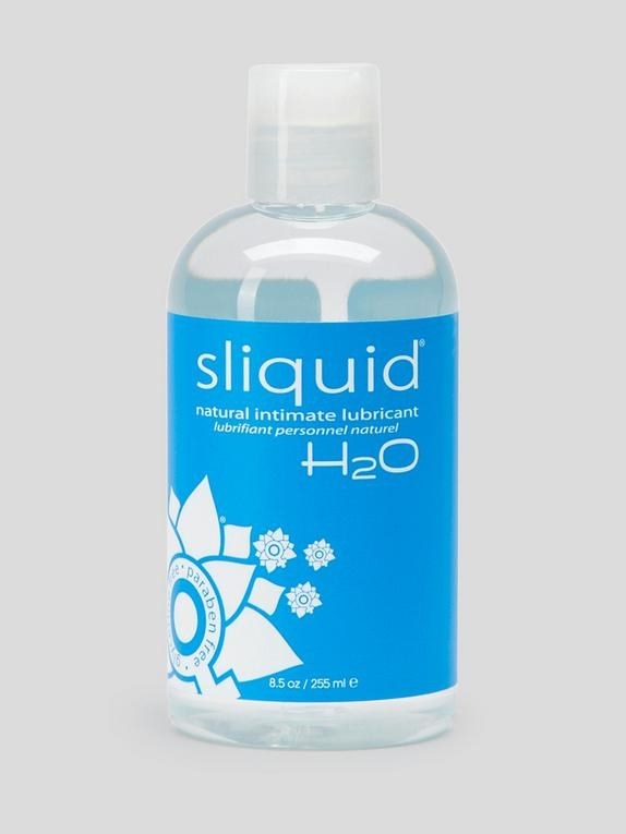 the clear bottle of Sliquid lube with a blue label