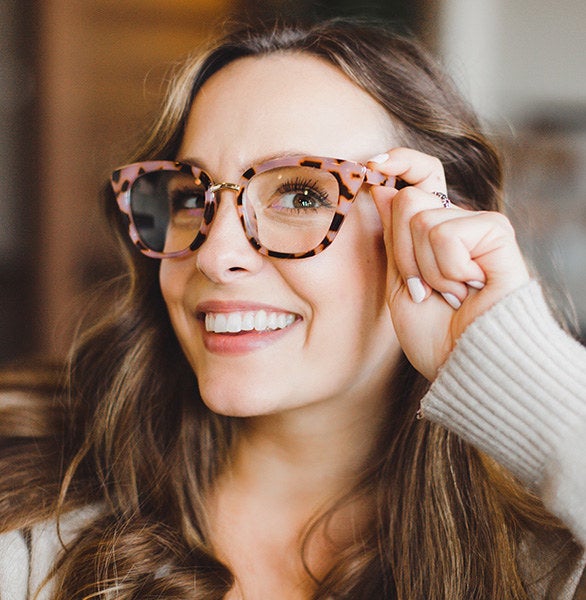 A person wearing the stylish, cat eye shaped anti-blue light glasses