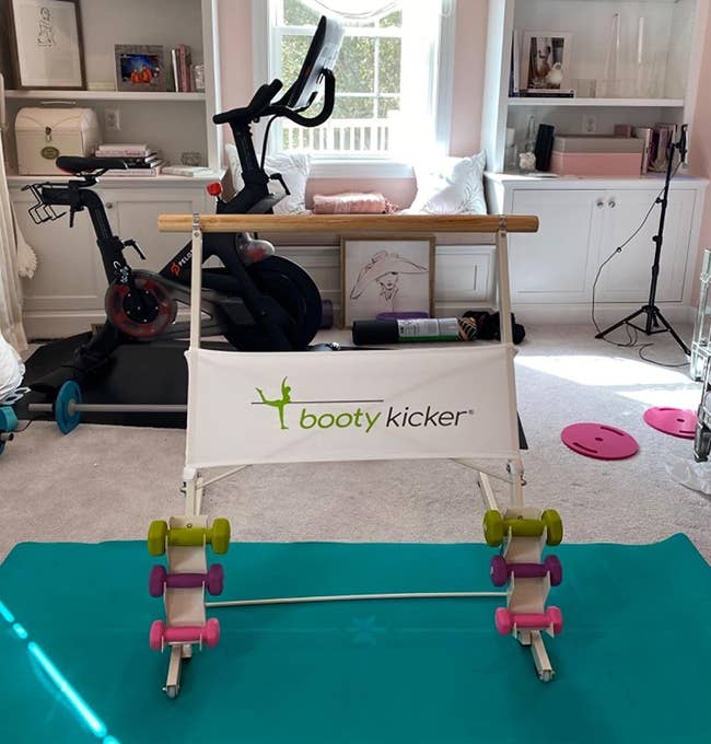 Booty Kicker barroom with weights connected the bottommost successful a reviewer's location gym