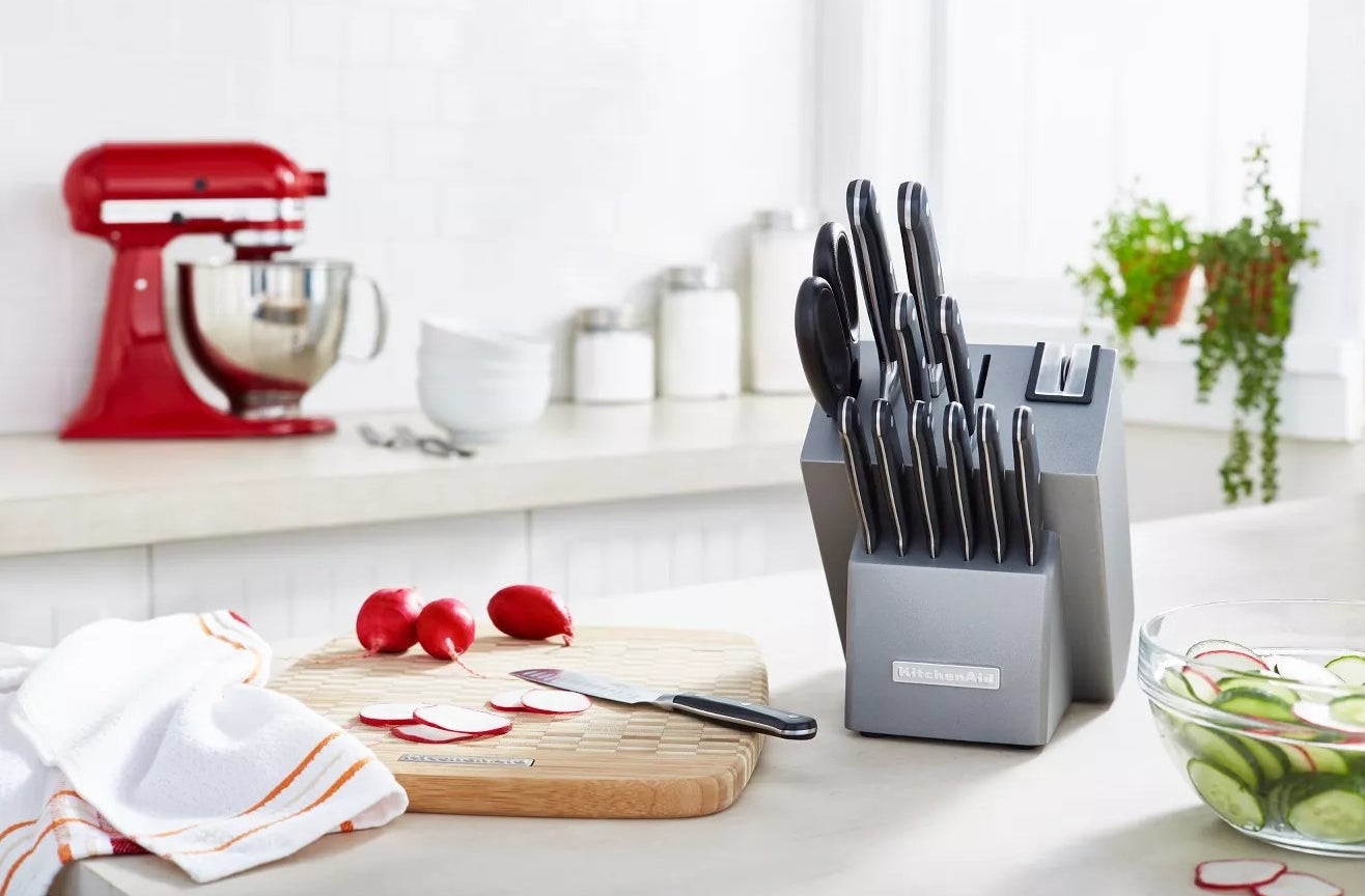 The knife set in its knife block on a kitchen counter