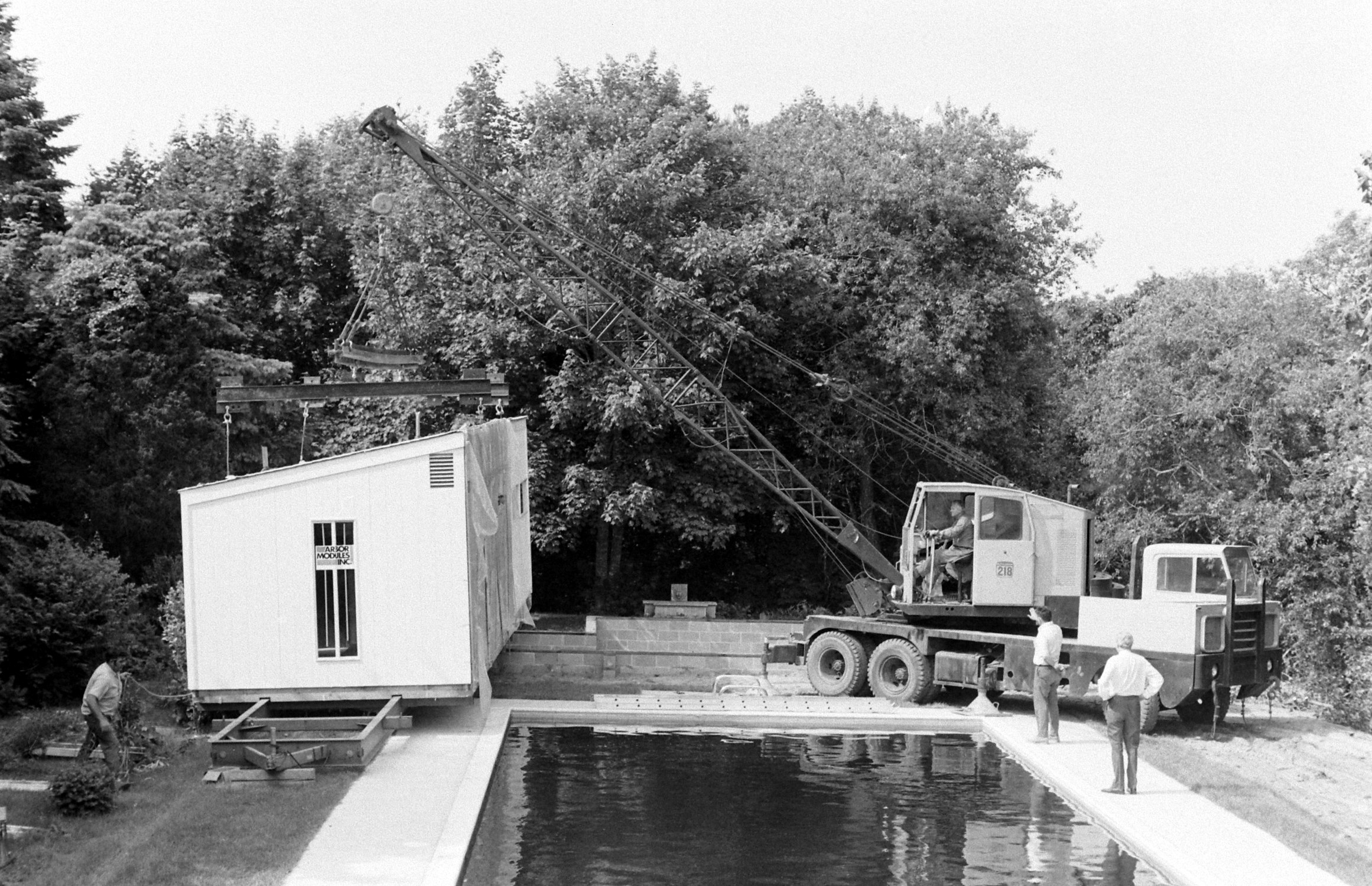 The construction of a private swimming pool in someone&#x27;s backyard in the 1970s