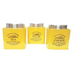 A set of 3 yellow tea, sugar and coffee containers