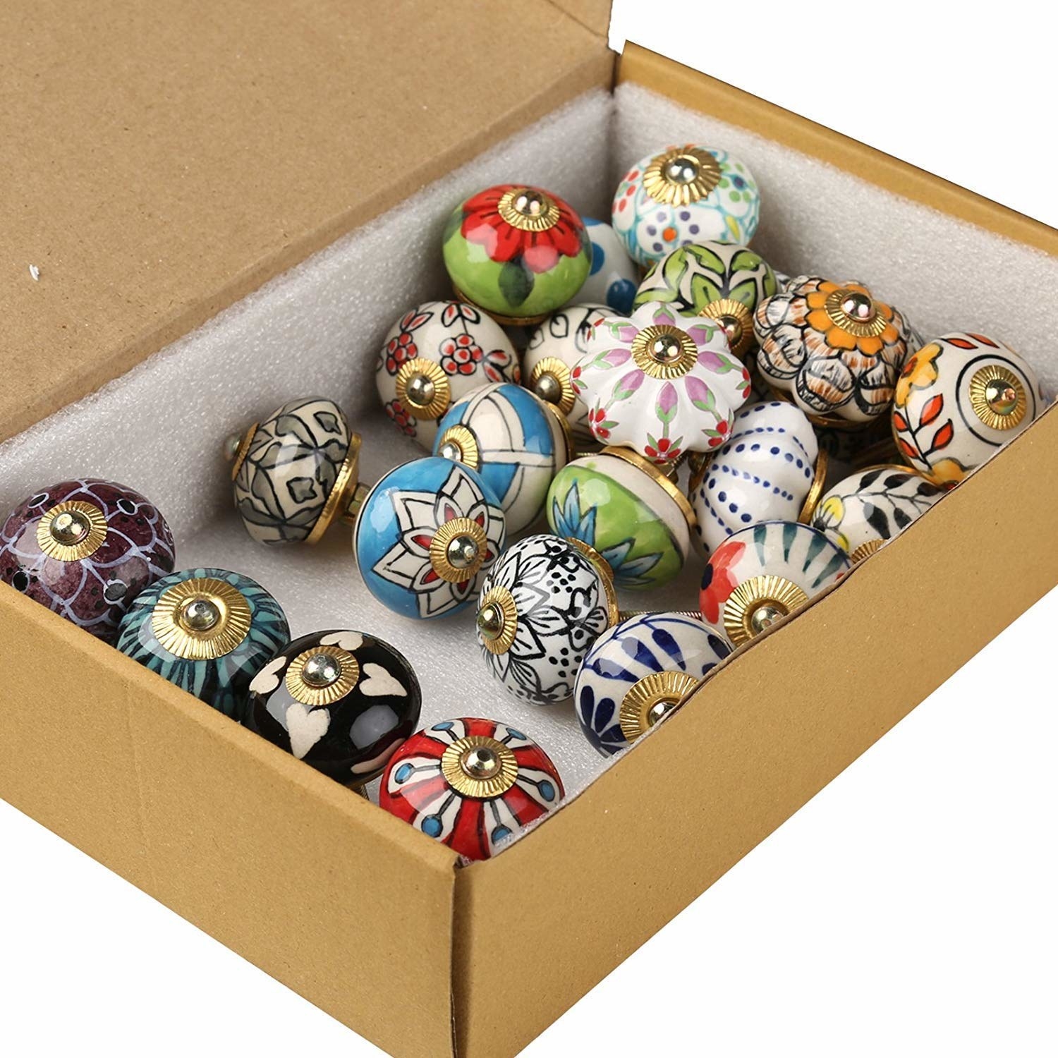 A set of colourful doorknobs in a box 