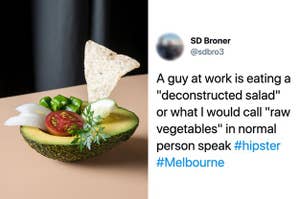 Half an avocado with a cherry tomato, piece of cucumber, onions and a corn chip resting where the seed normally sits, next to a tweet that reads "A guy at work is eating a 'deconstructed salad' or what I would call 'raw vegetables' in normal person speak"