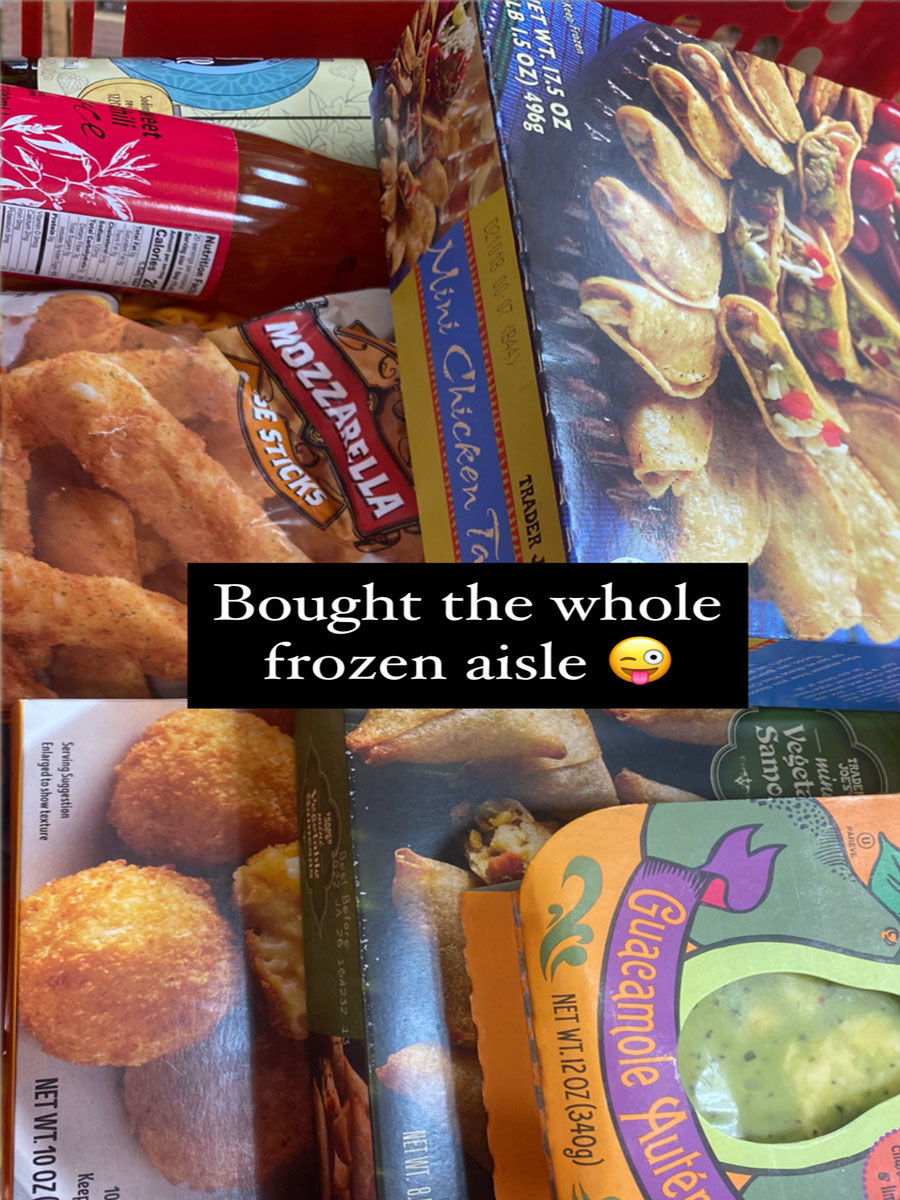A Trader Joe&#x27;s basket filled with food.