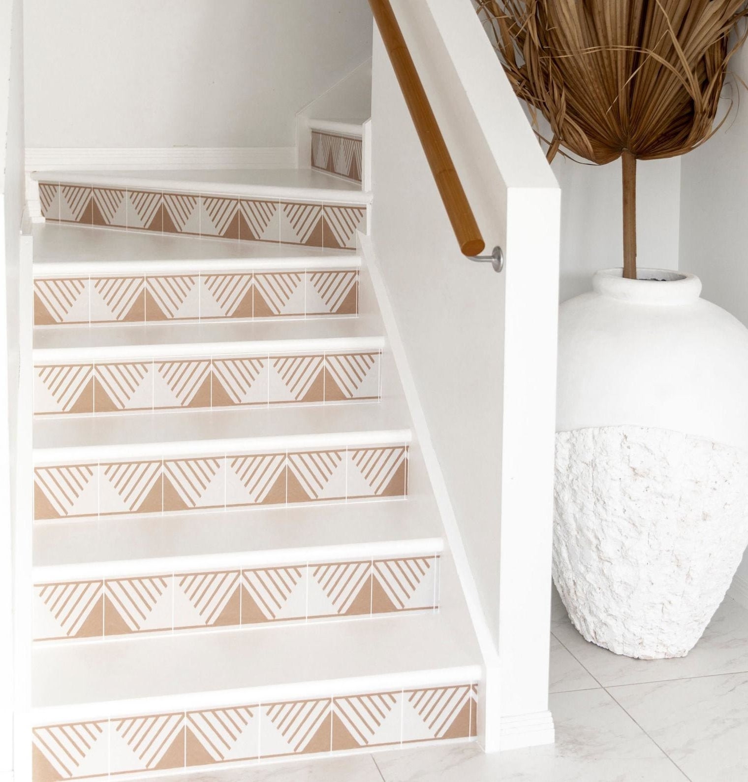 tan triangle with lines stickers on the vertical part of a set of stairs