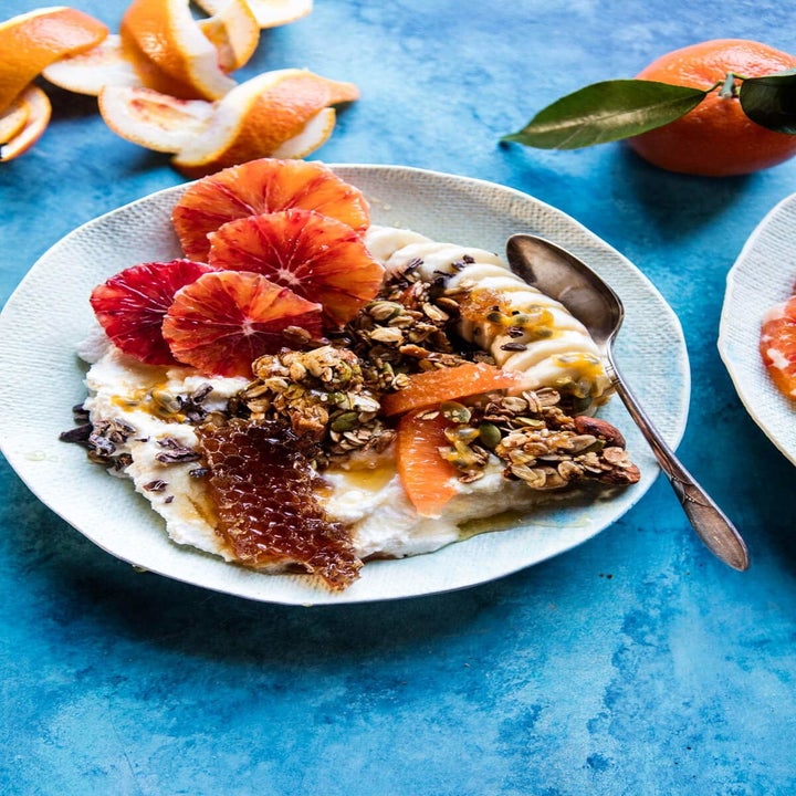 Ricotta breakfast bowls with grapefruit, granola, banana, and honeycomb. 