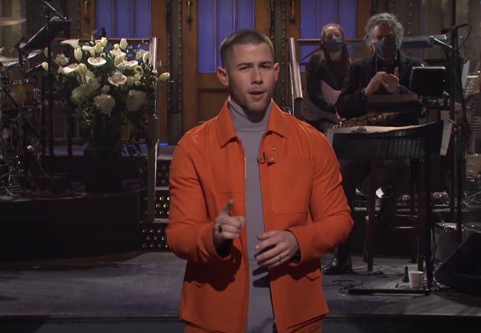 Nick Jonas speaking during the opening to SNL