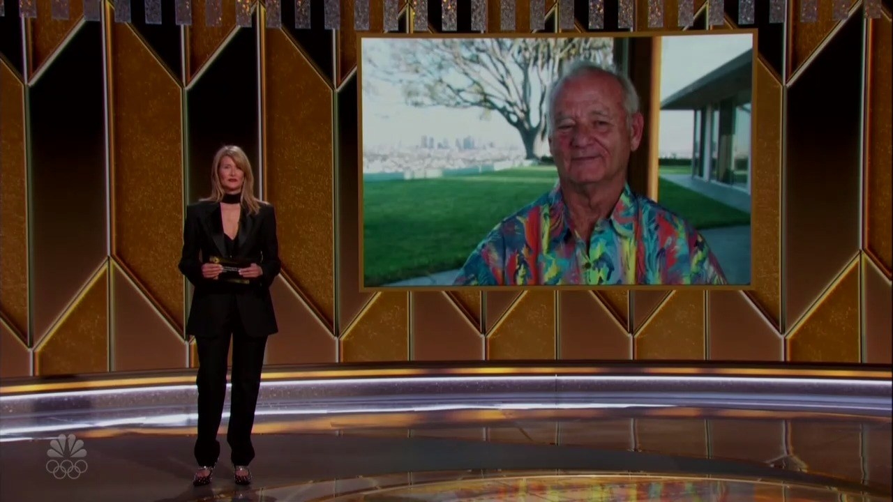 Laura Dern presents an award while Bill Murray sits at home in a Hawaiian shirt