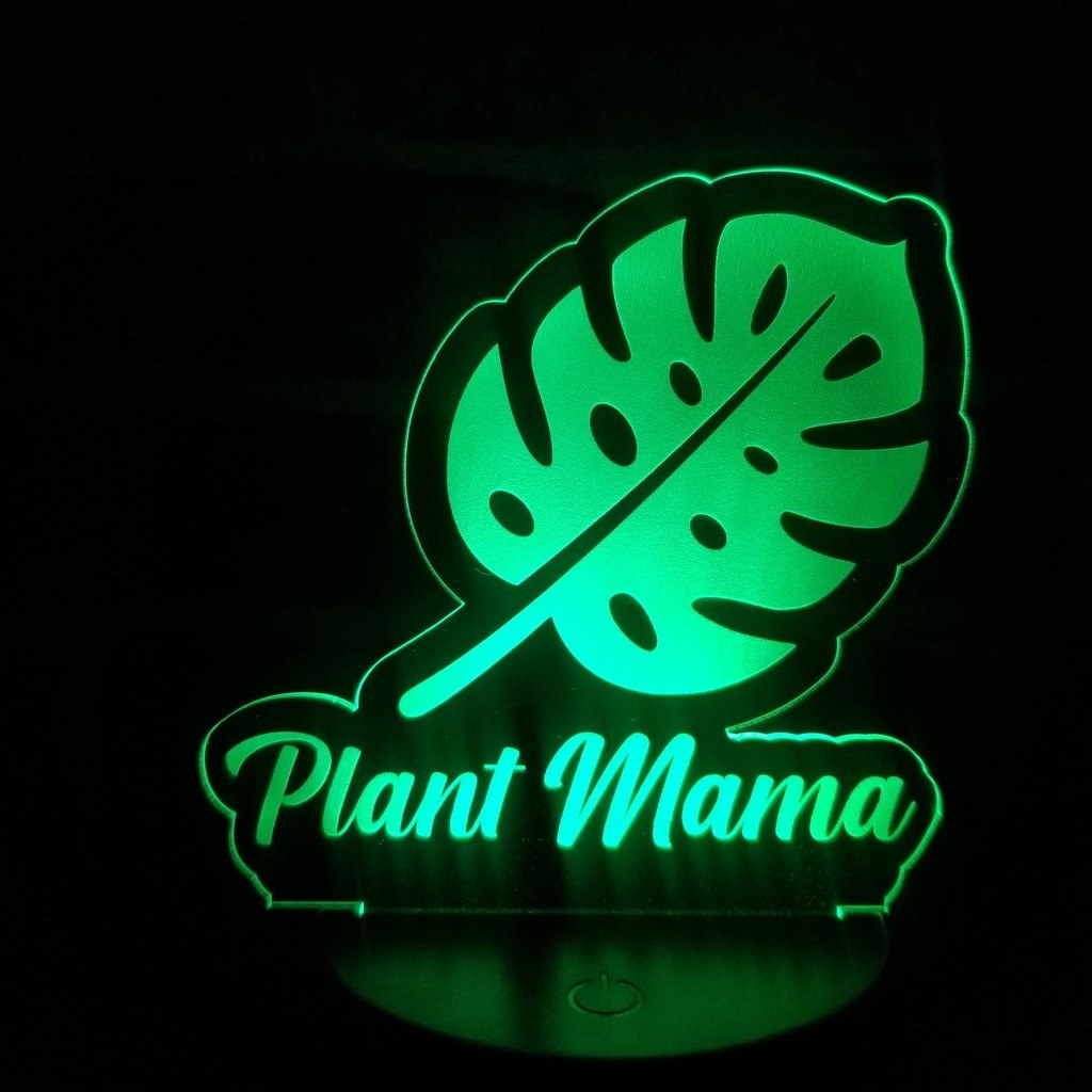 the plant mama LED light lit green