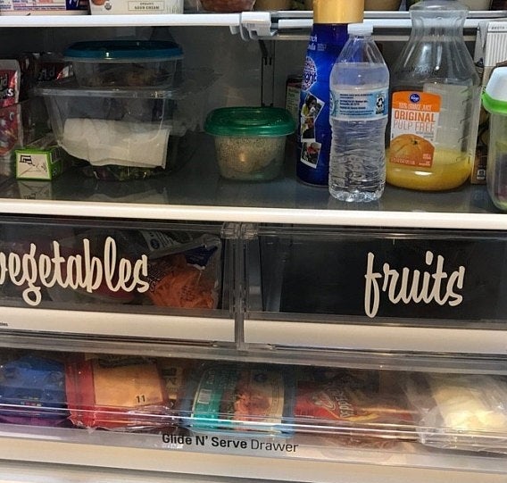 the decals attached to two drawers that read &#x27;vegetables and &quot;fruits&quot;