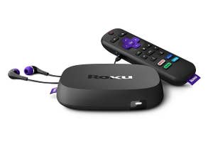 The Roku, and remote, shown with headphones plugged in.