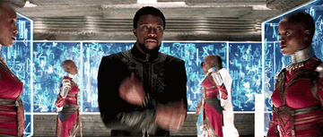 Chadwick Boseman in Black Panther doing the &quot;Wakanda Forever&quot; salute