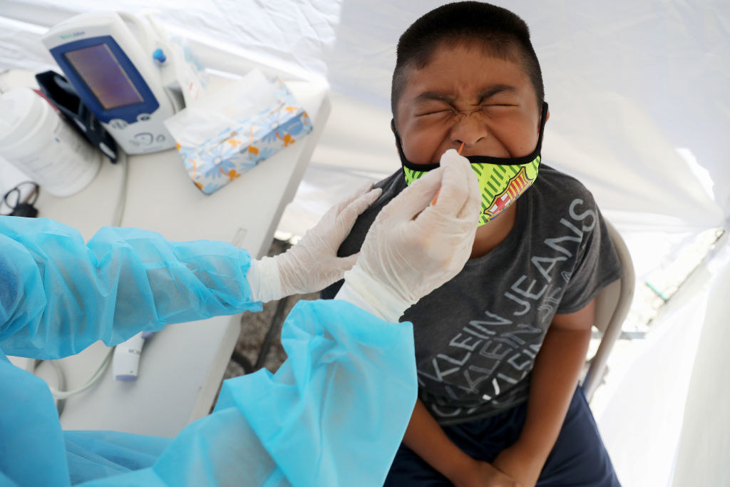 Young boy getting tested for coronavirus