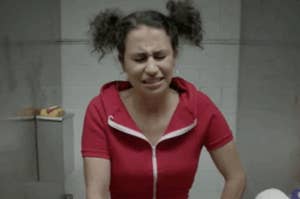 Illana from broad city sitting on the toilet
