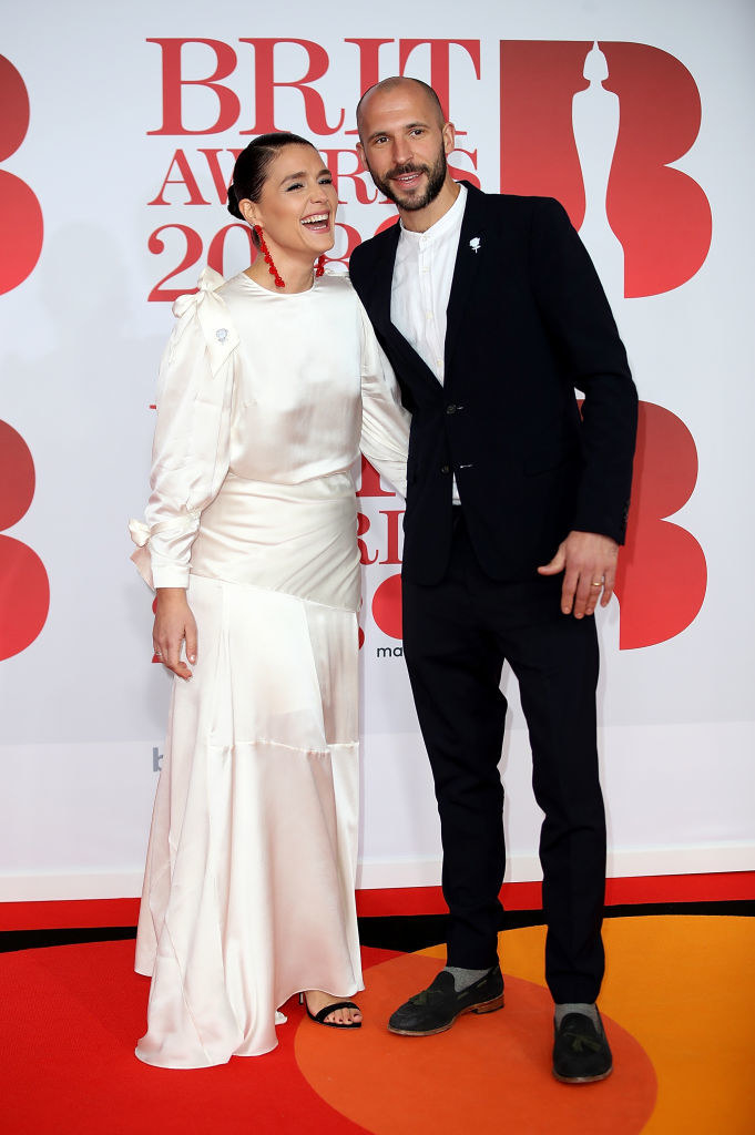 Jessie Ware (L) and Sam Burrows attend The BRIT Awards 2018 held at The O2 Arena on February 21, 2018 in London, England