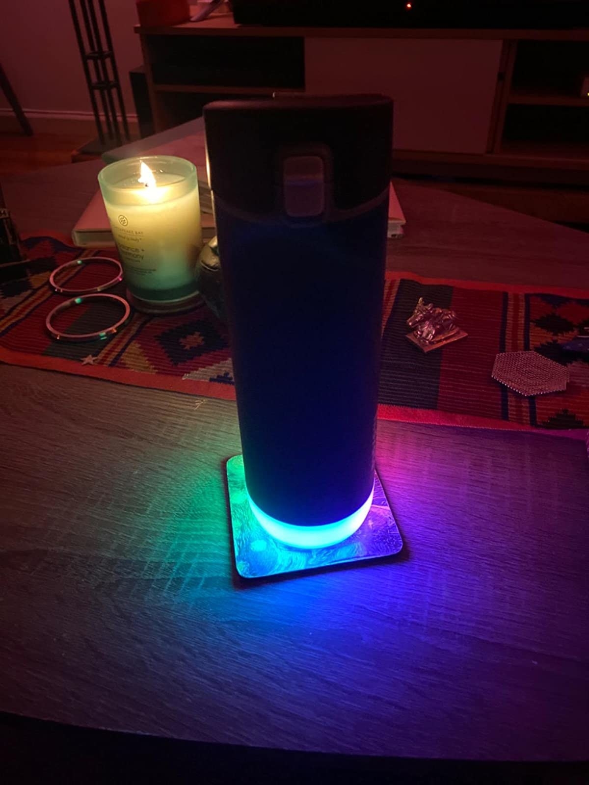 The glowing water bottle on a table