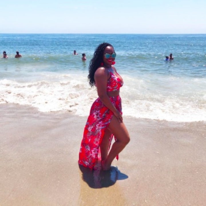 person wearing a pink two piece maxi dress on the beach