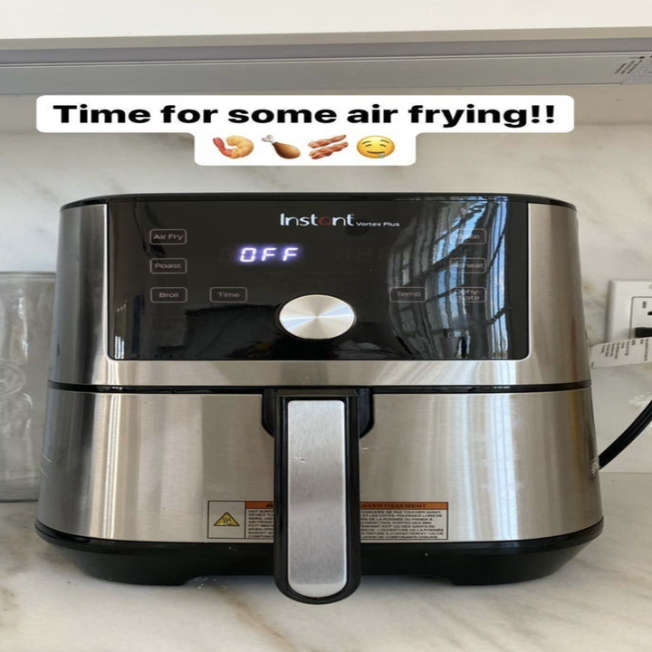 An airfryer on a kitchen countertop.