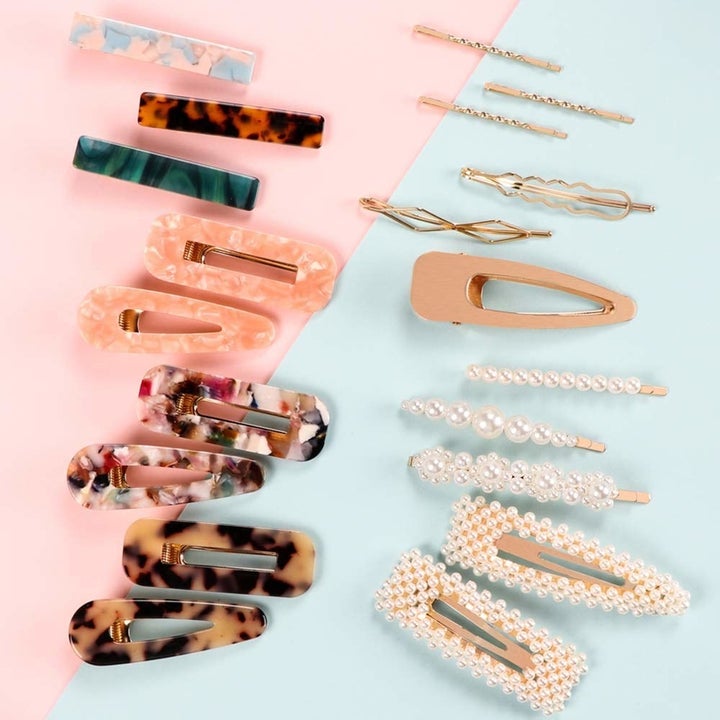 20 different styles of barrettes lying flat on a background