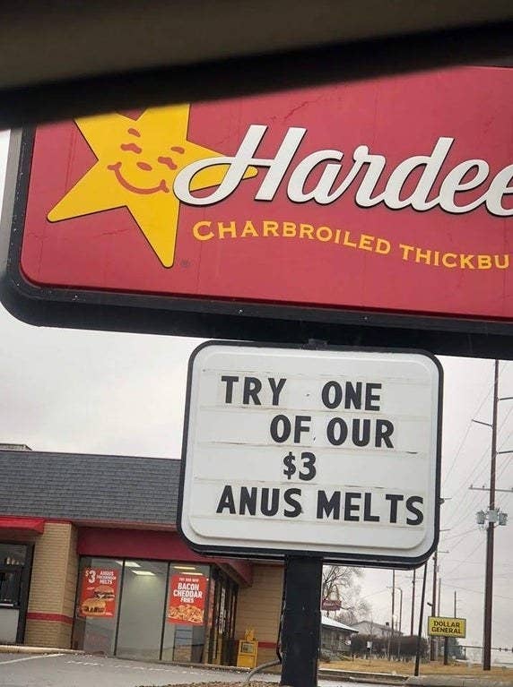 sign reading try one of our $3 anus melts below a Hardee&#x27;s logo