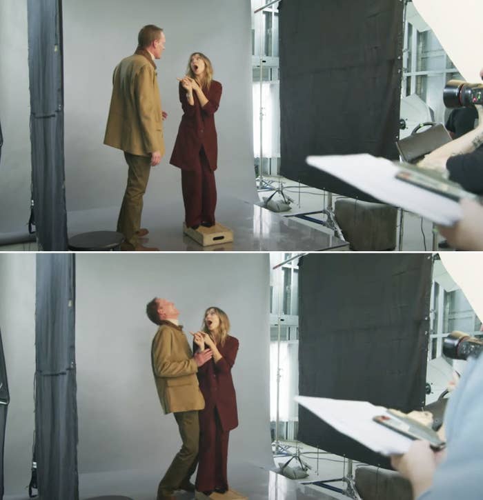 Elizabeth Olsen pointing at Paul Bettany and making him laugh