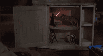Fictional action figures coming to life and fighting inside a cupboard 