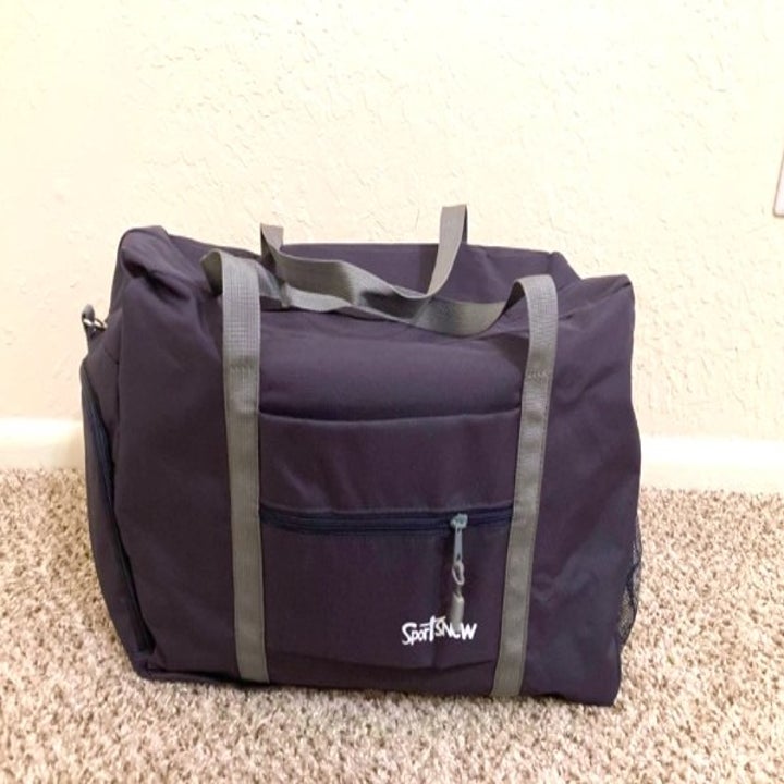 front view of a gray sports bag