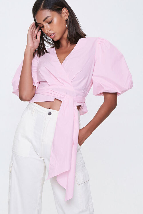 A model wearing the pink poplin top