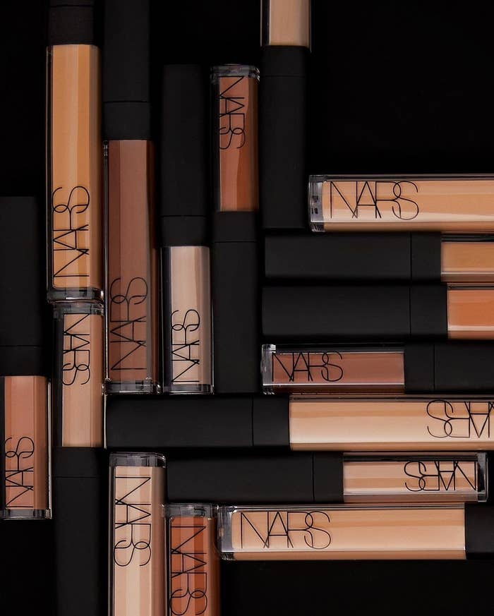A bunch of thin tubes of concealer in a pile