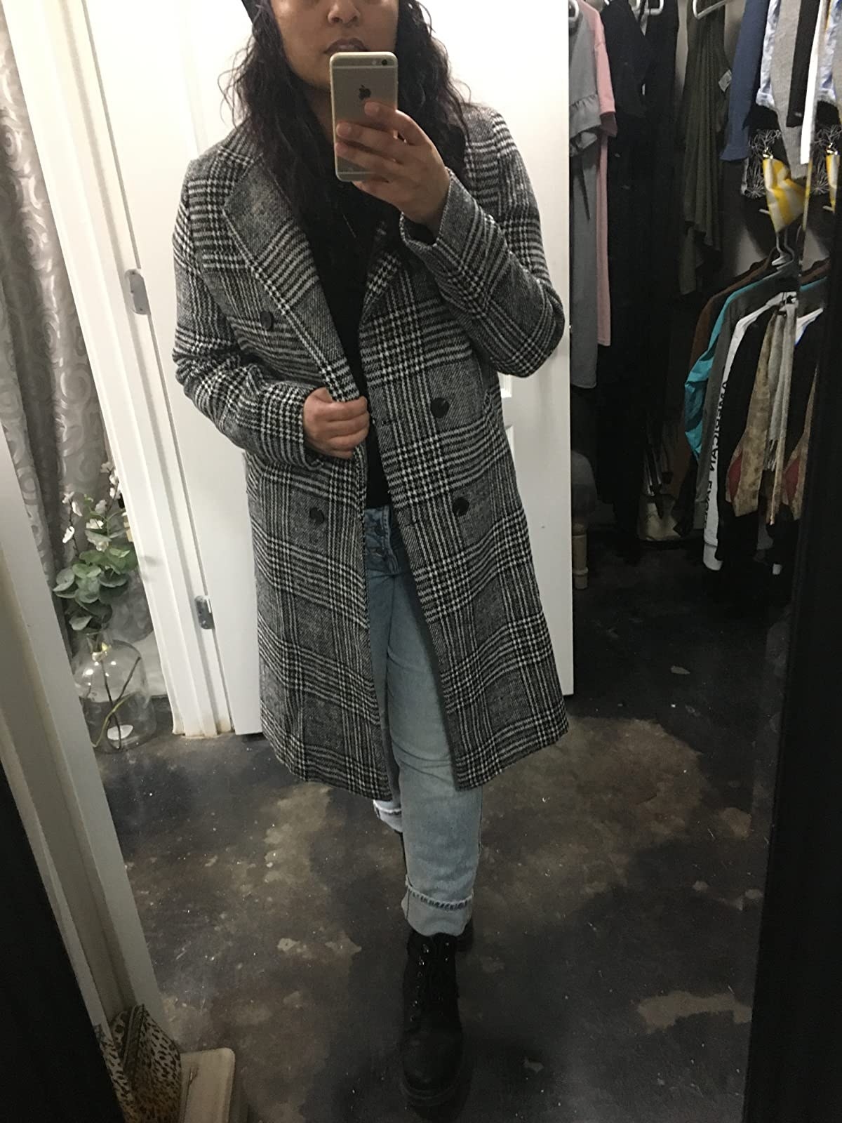 The coat worn by an Amazon reviewer taking a mirror selfie