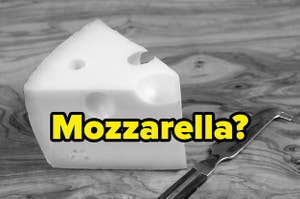 A black and white photo of Swiss cheese that has 