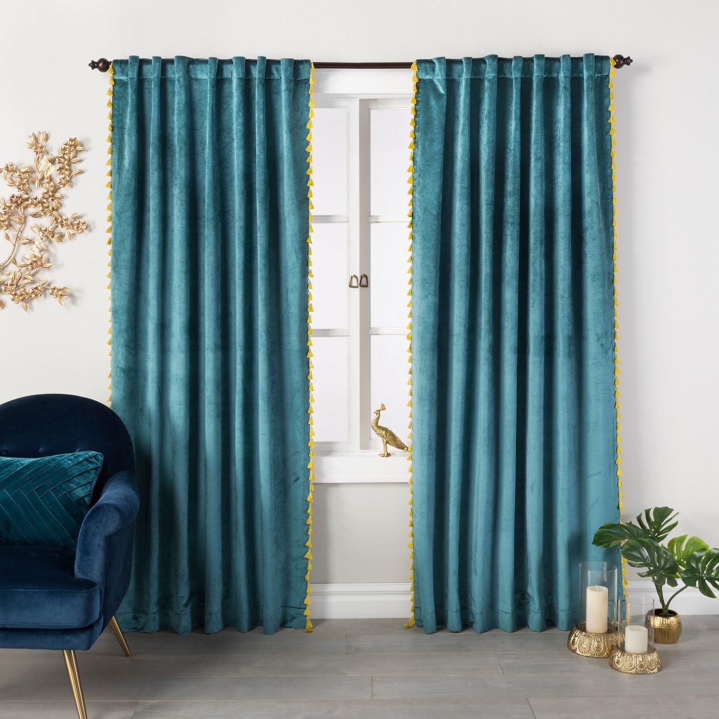 Teal velvet curtain panel with chartreuse tassels 