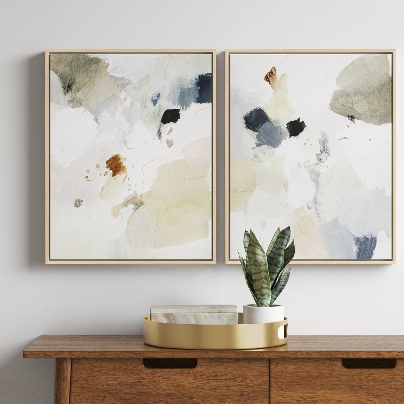 Neutral abstract watercolor pieces in gold frame 