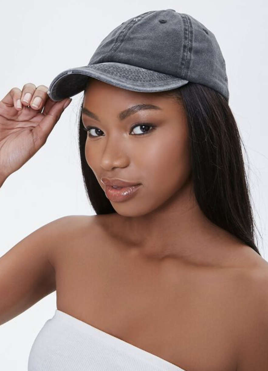 the hat in black on a model