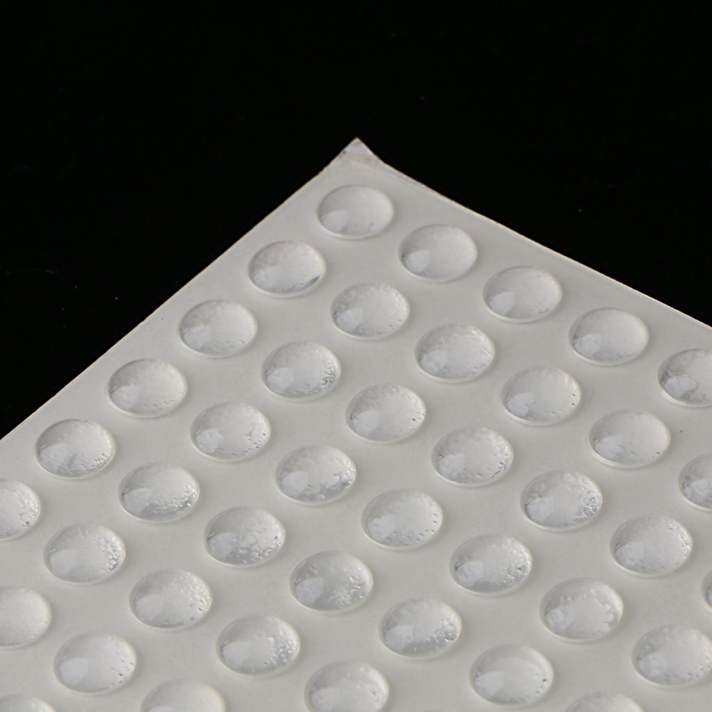 A set of sound dampening stickers against a white background 