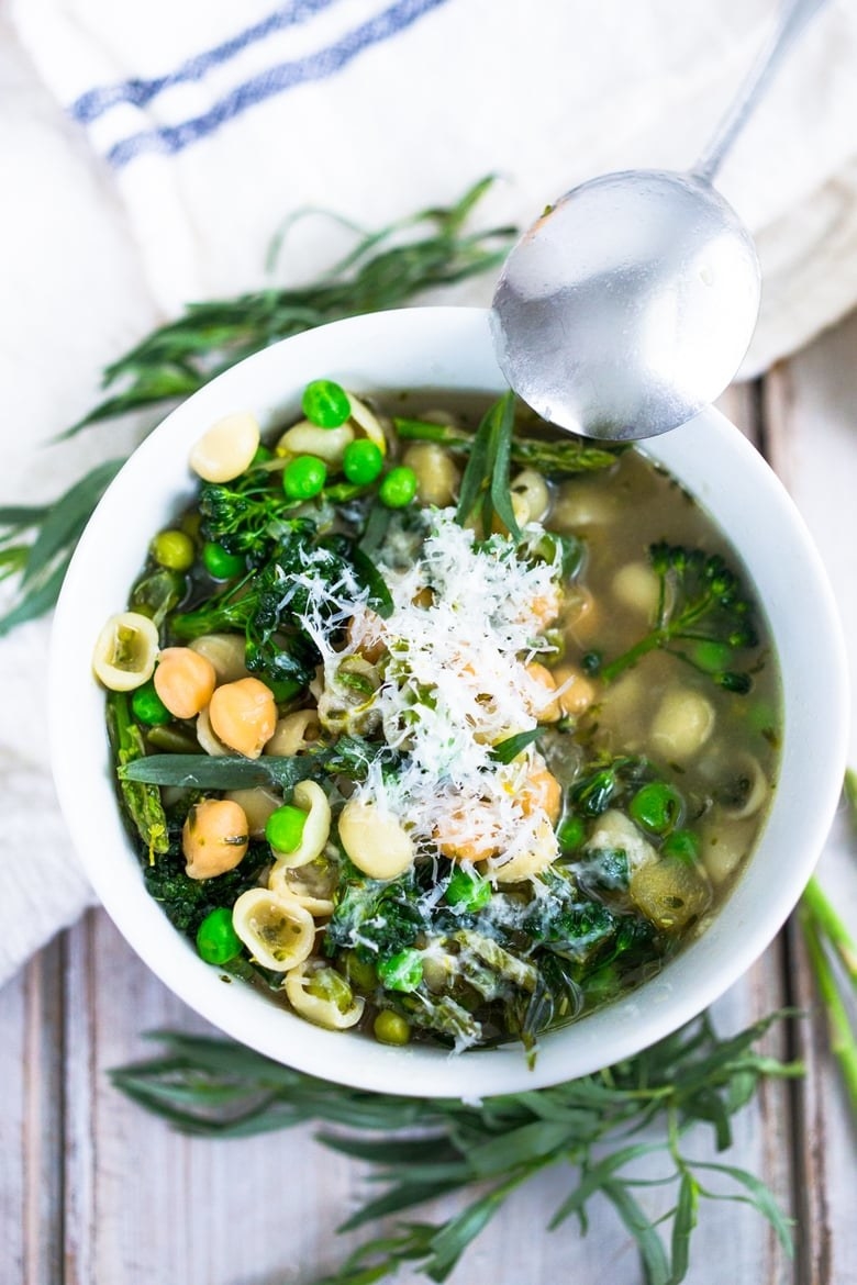 Spring minestrone soup with Parmesan cheese.