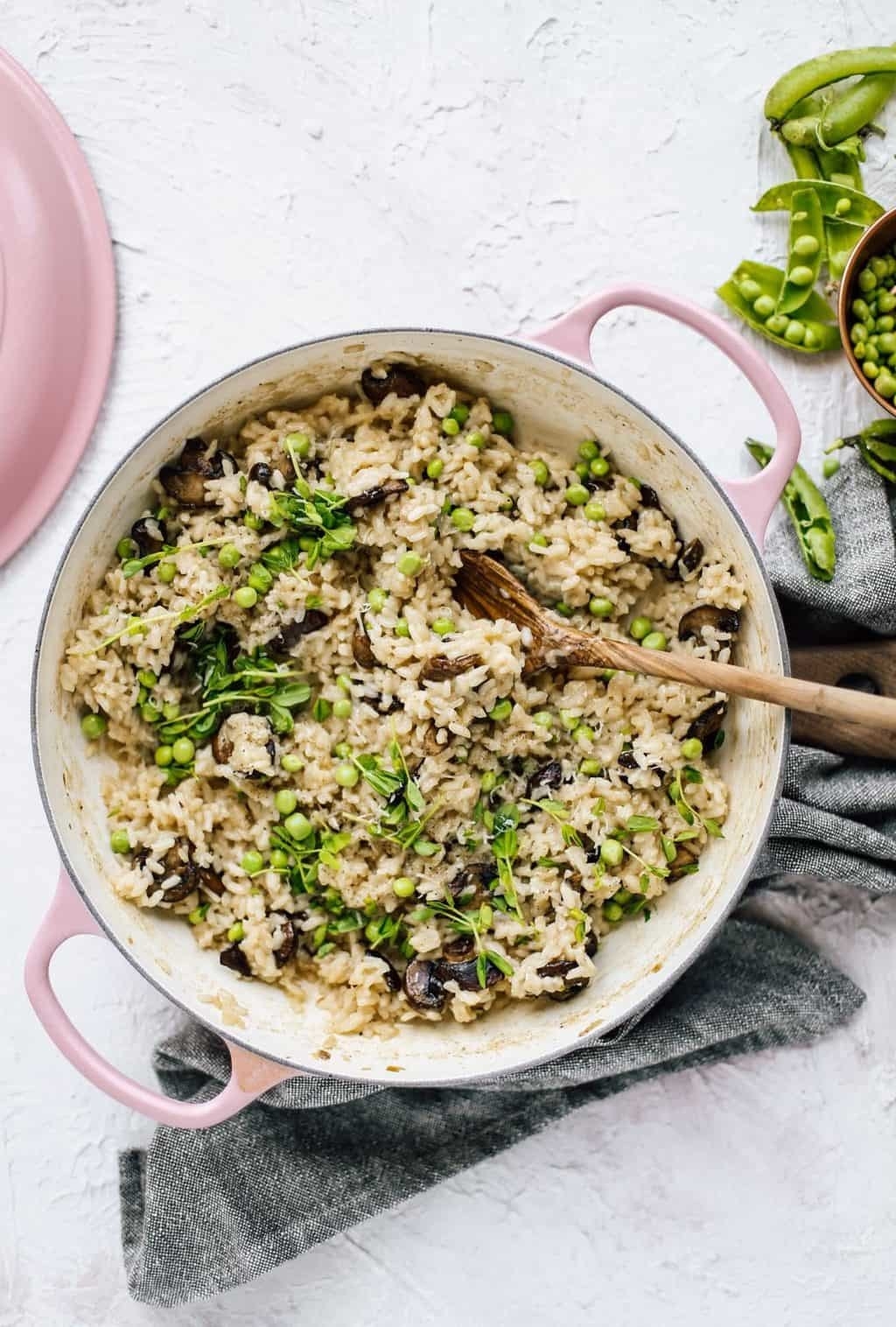 Spring risotto with peas and mushrooms. 