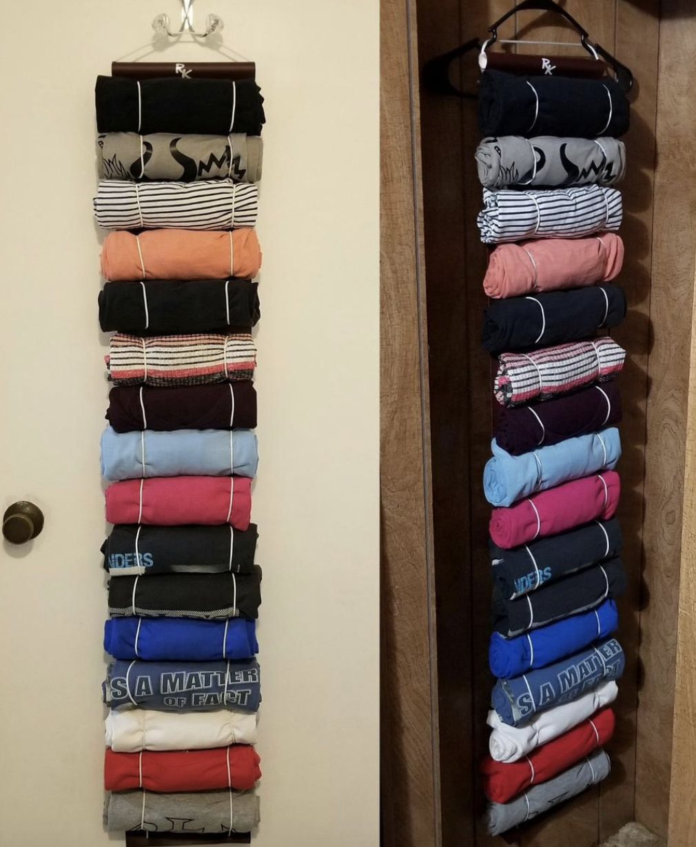 image of the closet organizer hanging over door with t-shirts stored in it 