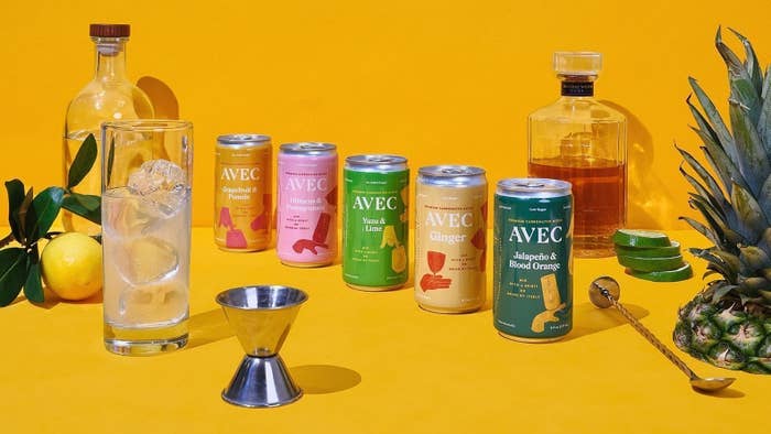 five cans of the mixer in different flavors