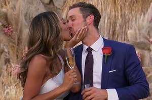 Zac and Tayshia kissing after getting engaged