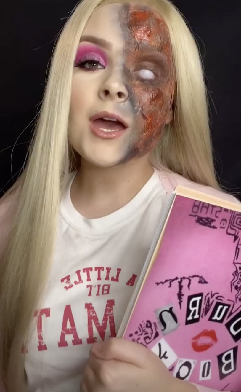 Ella dressed like Regina George from &quot;Mean Girls&quot; with gore makeup on half her face