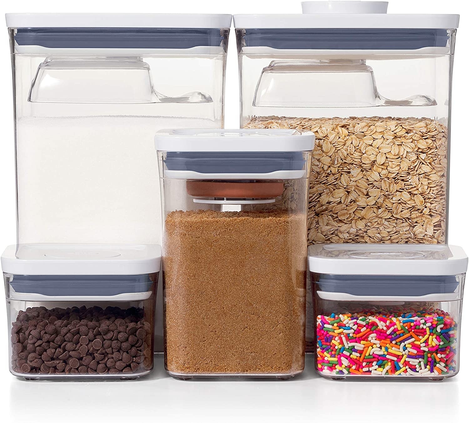the eight piece set of clear containers with white lids
