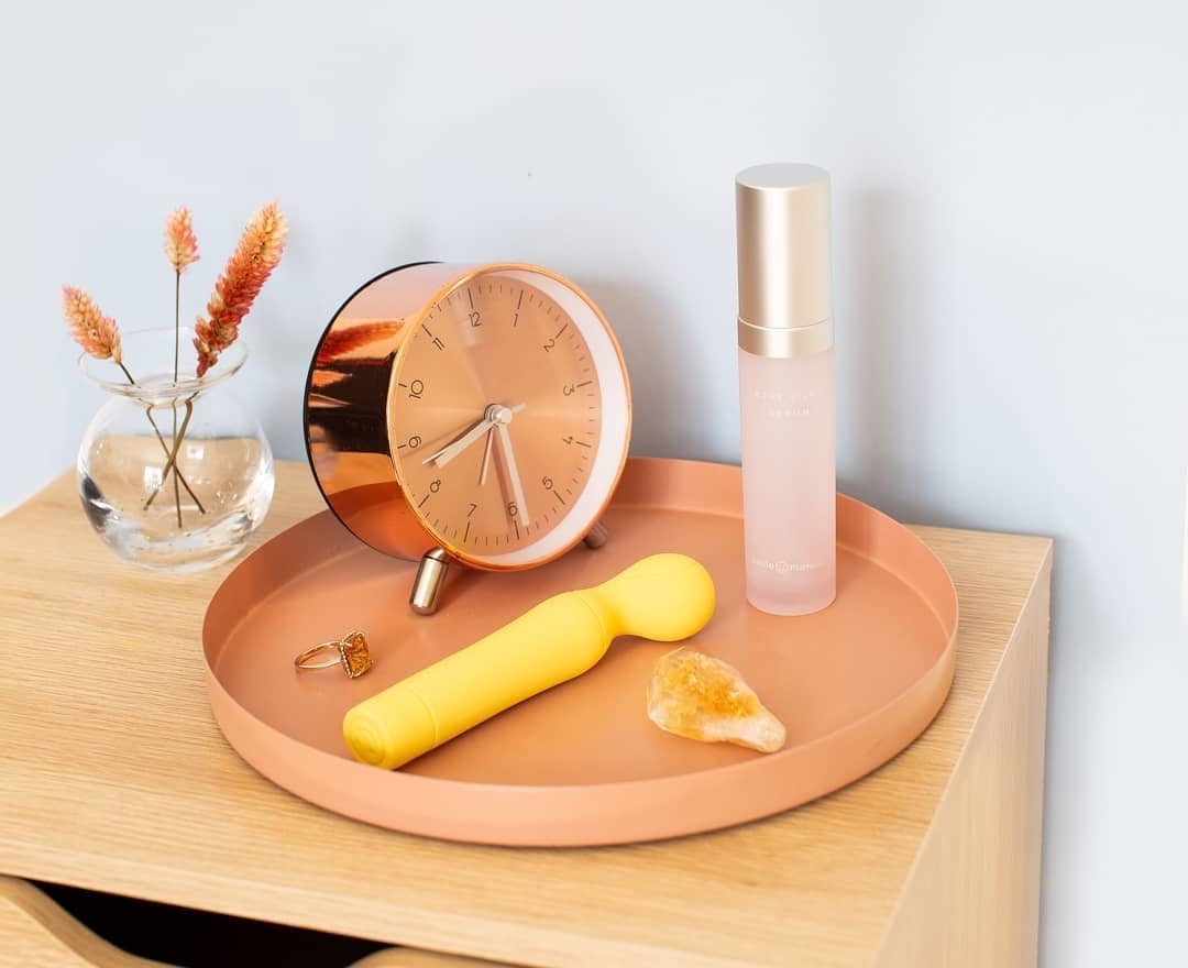 A bulbous-tipped wand on a nightstand