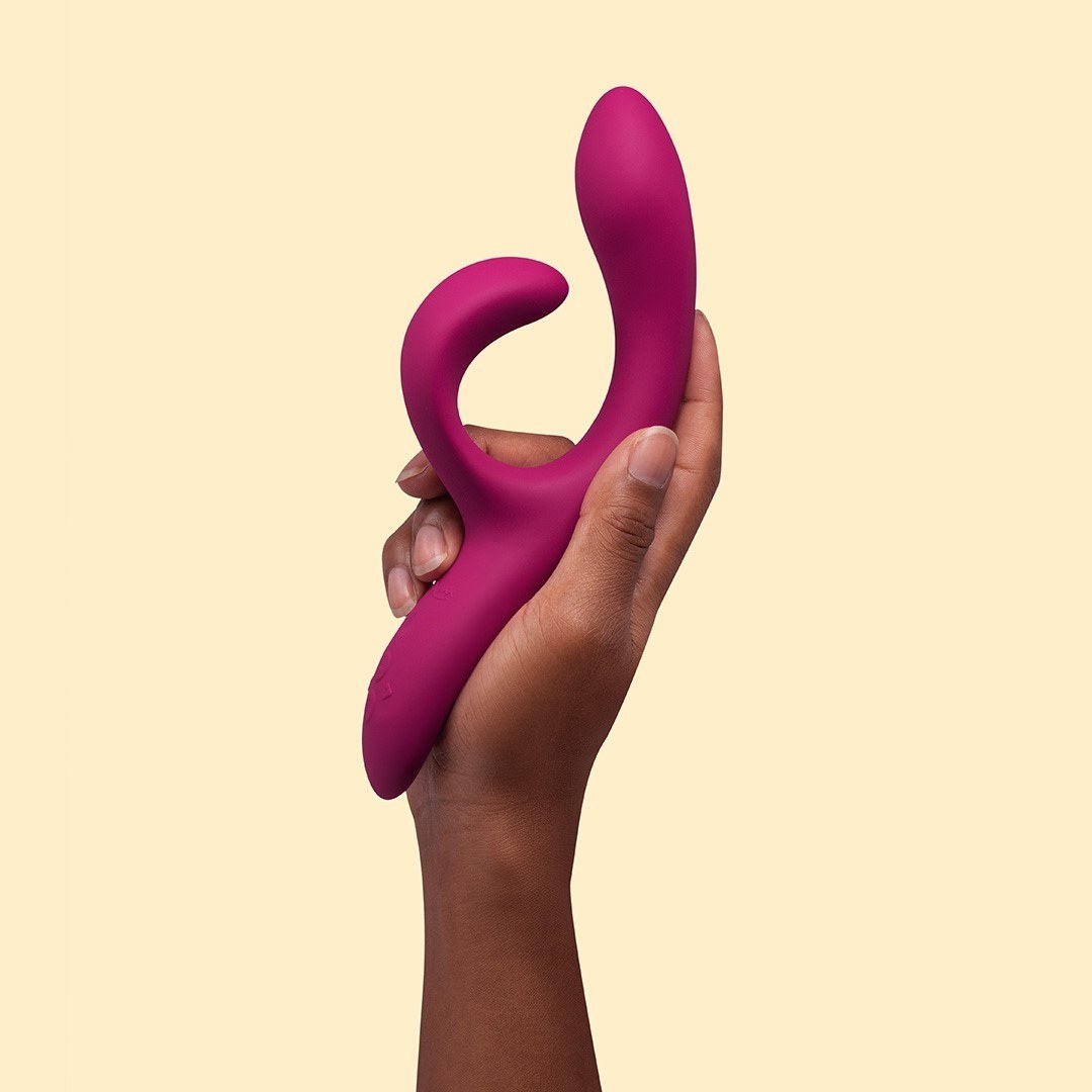 A person holding the curvy vibrator 